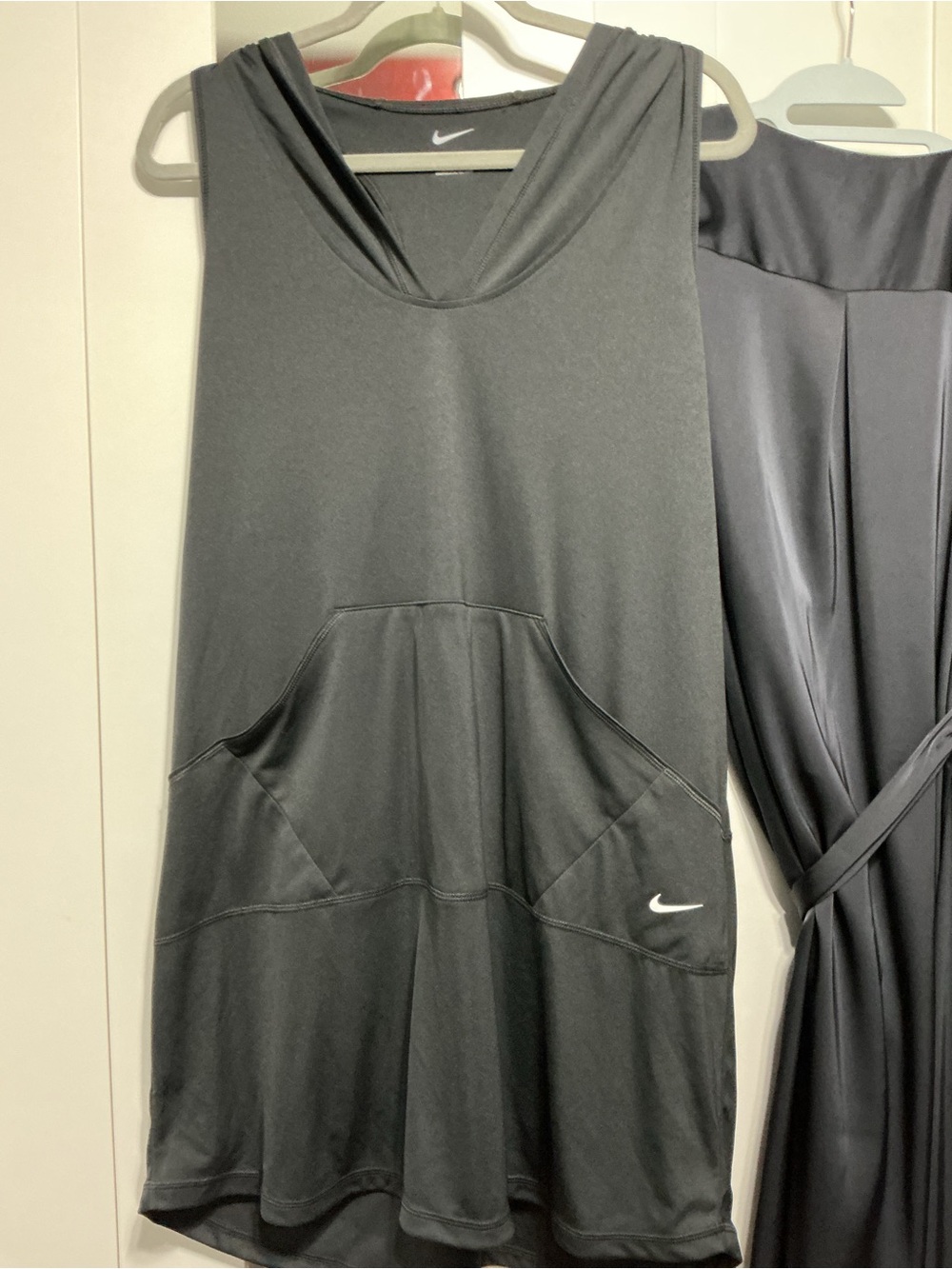 Nike Black Sleeveless Sports coverup with Pockets and hood.